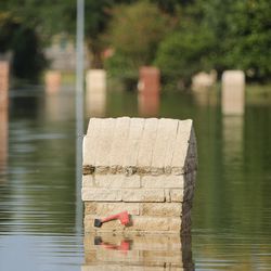 Half-submerged mail boxes are pictured in Klein, Texas, on Wednesday, Aug. 30, 2017, following Tropical Storm Harvey.
