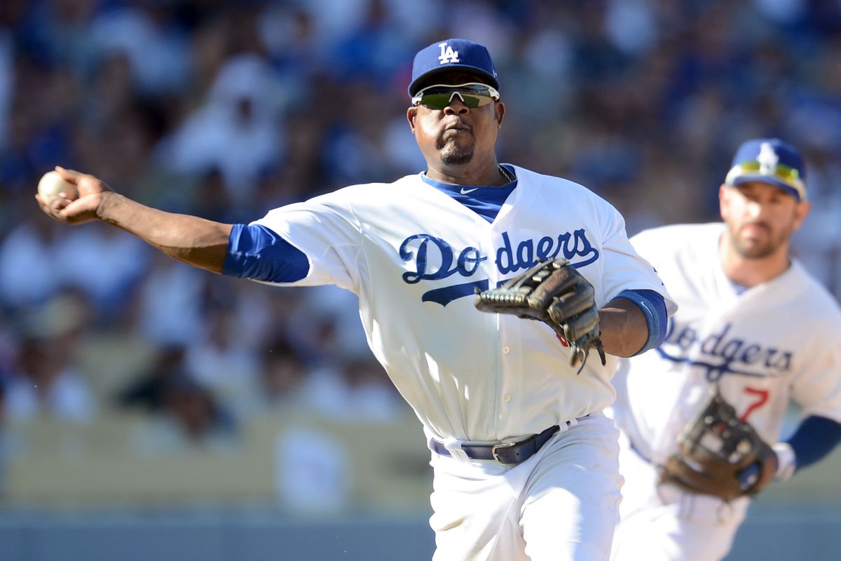 Juan Uribe takes care of business in the field