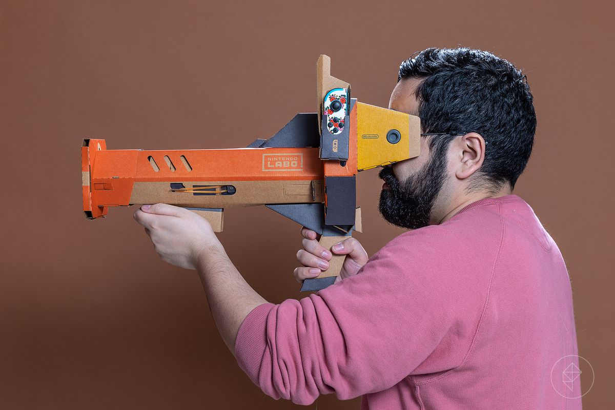 Nintendo Labo VR Kit - profile view of Jeff holding Blaster Toy-Con