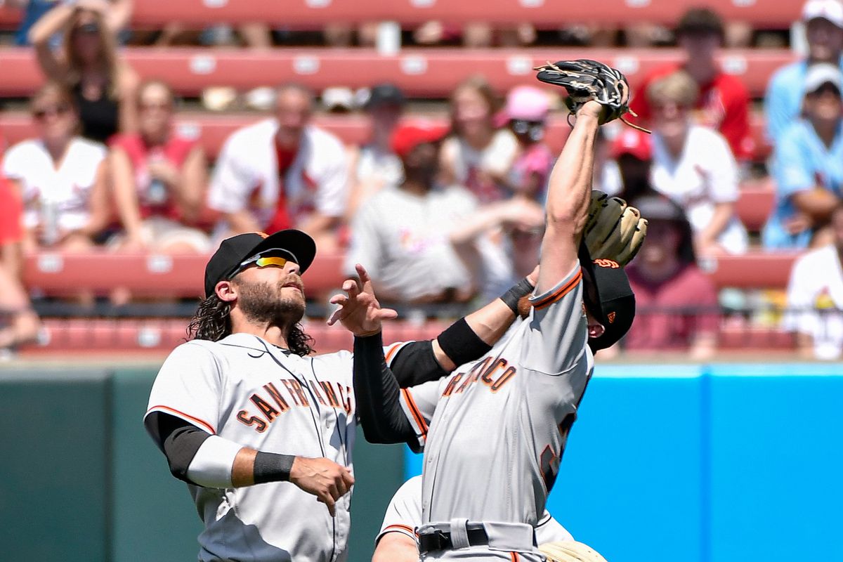 A photo of Donovan Watson making a catch after almost colliding with Brandon Crawford during Saturday’s game. 