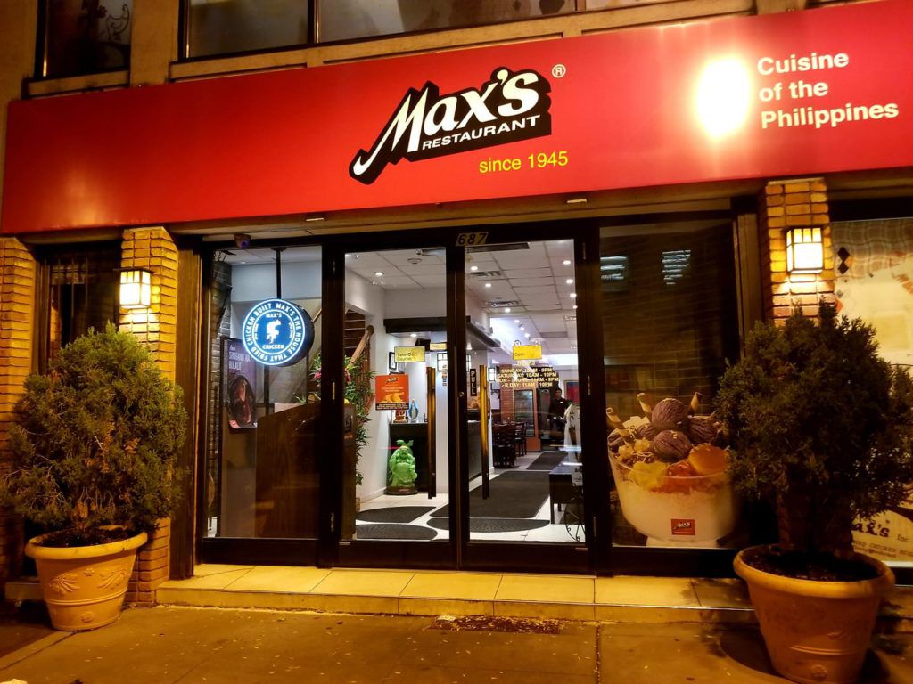 The exterior of a restaurant with a red sign that says “Max’s since 1945.”