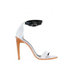 <i><a href="http://www.tibi.com/shop/sale/amber-heel-black-white-multi">Amber Heel</a>, $168.75 (was $375)</i>