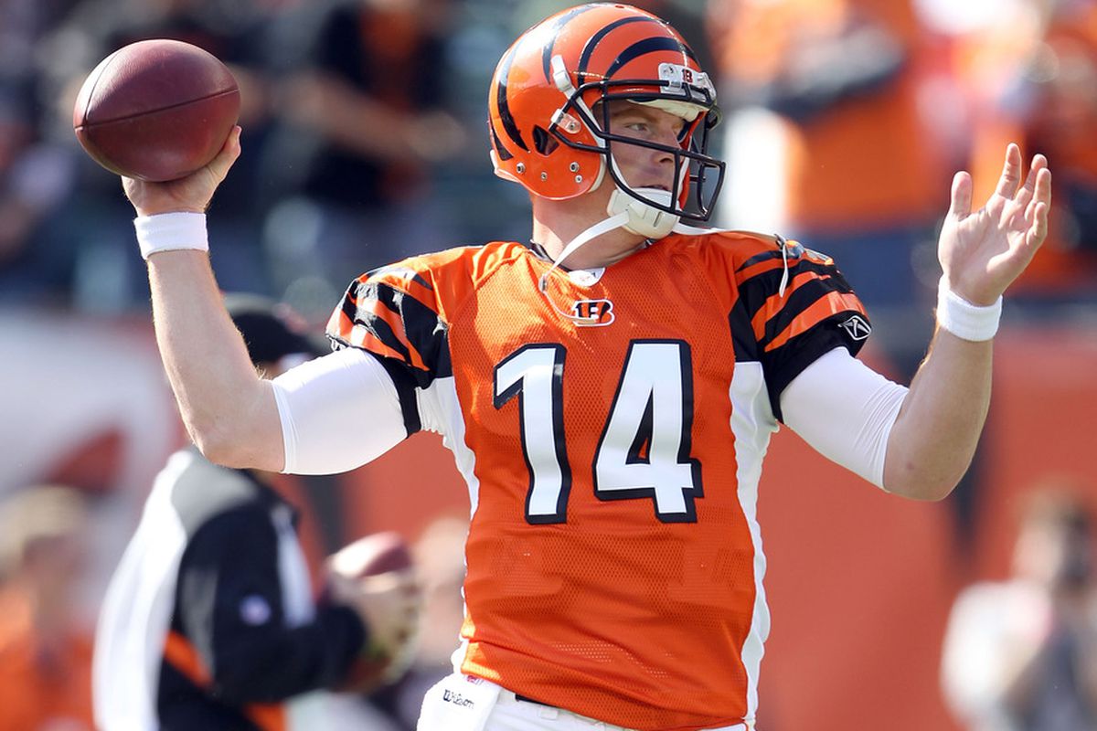 CINCINNATI, OH - OCTOBER 16: Andy Dalton #14 of the Cincinnati Bengals throws a pass before the start of the NFL game against the Indianapolis Colts at Paul Brown Stadium on October 16, 2011 in Cincinnati, Ohio.  (Photo by Andy Lyons/Getty Images)
