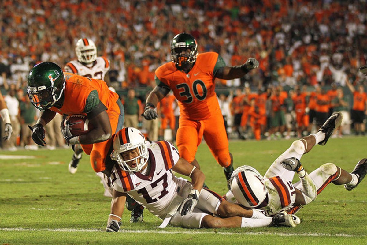 MIAMI - NOVEMBER 20: Lamar Miller #6 of the Miami Hurricanes runs for a touchdown during a game against the Virginia Tech Hokies at Sun Life Stadium on November 20 2010 in Miami Florida.  (Photo by Mike Ehrmann/Getty Images)