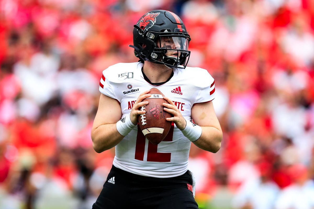 Logan Bonner of the Arkansas State Red Wolves looks to pass during the game against the Arkansas State Red Wolves at Sanford Stadium on September 14, 2019 in Athens, Georgia.