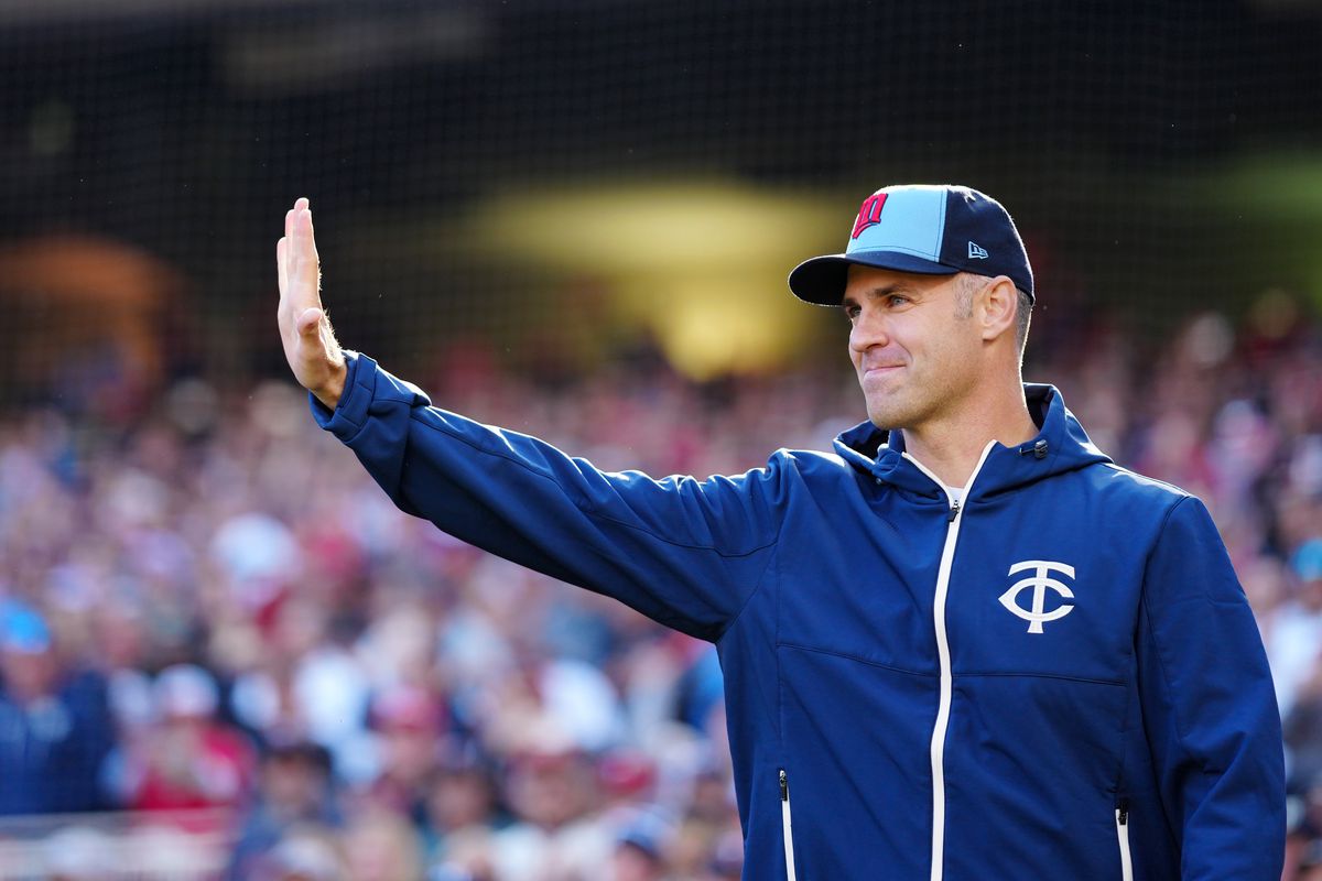 Former Minnesota Twin Joe Mauer waves to the crowd prior to Game 3 of the Division Series between the Houston Astros and the Minnesota Twins at Target Field on Tuesday, October 10, 2023 in Minneapolis, Minnesota.