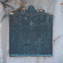 This historical plaque identifies and interprets the site of the Brigham Young summer home at Soda Springs, Idaho.