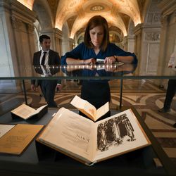 Jennie Taylor, widow of former North Ogden mayor and major in the U.S. Army National Guard Brent Taylor who was killed in Afghanistan in November 2018, looks at a display of the Book of John during a tour of the Library of Congress in Washington, D.C., on Feb. 6, 2019. She is accompanied by Utah a Rob Bishop, R-Utah, staff member Devin Wiser, left, and Brent's parents Tamara and Stephen Taylor, right.
