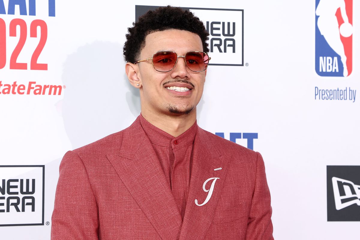 Johnny Davis poses for photos on the red carpet during the 2022 NBA Draft at Barclays Center on June 23, 2022 in New York City.
