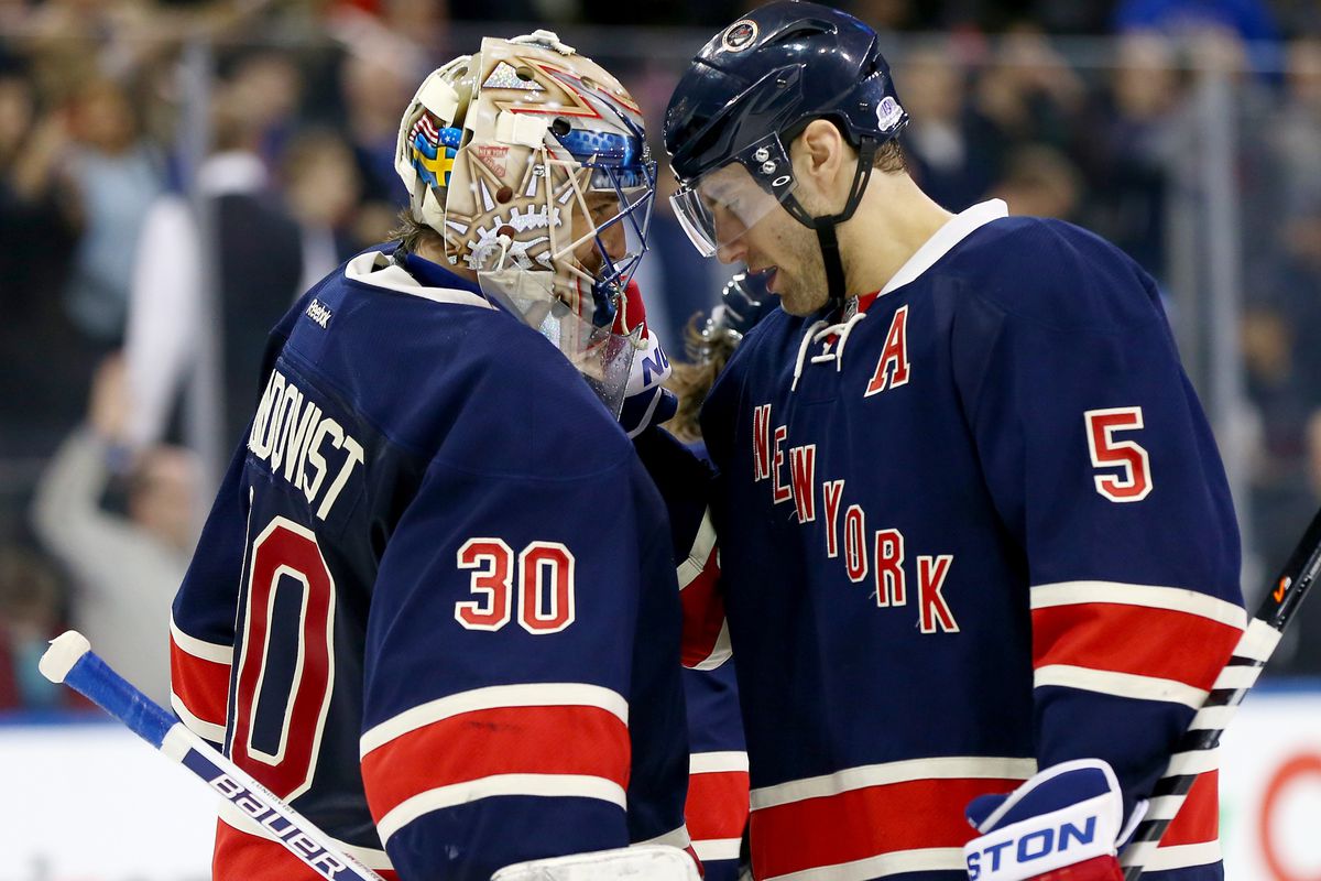 With help (and hugs) from Dan Girardi, Henrik Lundqvist earned his 50th career NHL shutout. 