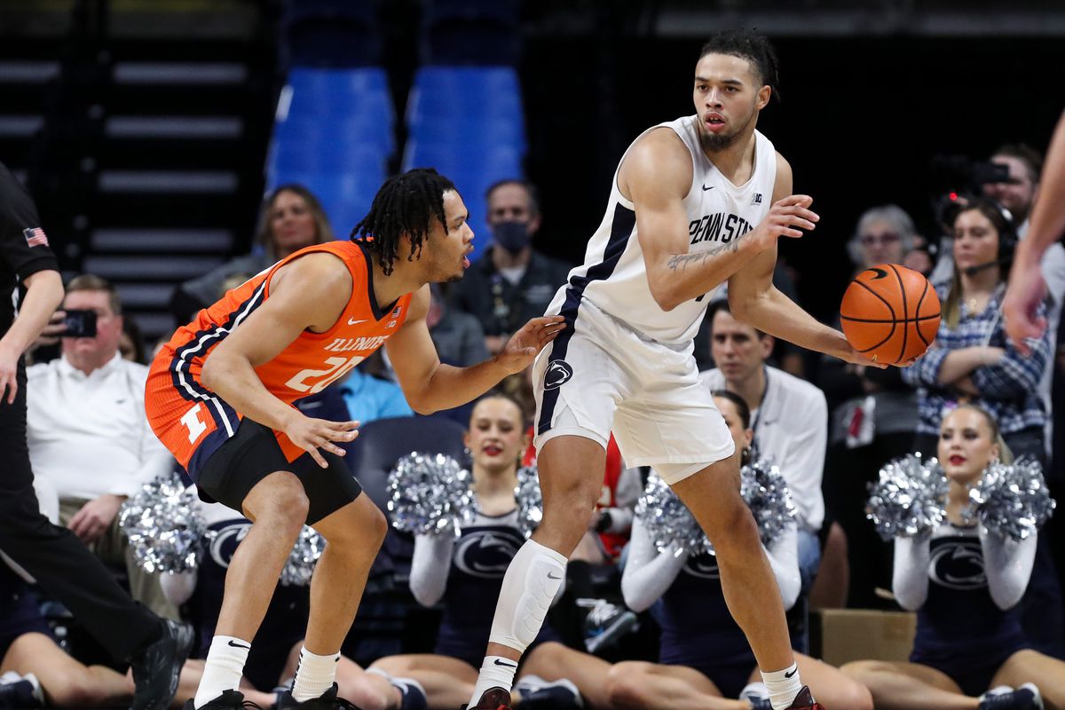 Feb 14, 2023; University Park, Pennsylvania, USA; Penn State Nittany Lions guard/forward Seth Lundy (1) holds the ba;; as Illinois Fighting Illini guard/forward Ty Rodgers (20) defends during the second half at Bryce Jordan Center. Penn State defeated Illinois 93-81.