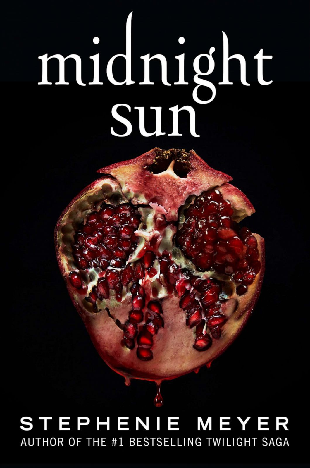 the cover for midnight sun, featuring a lush pomegranate 