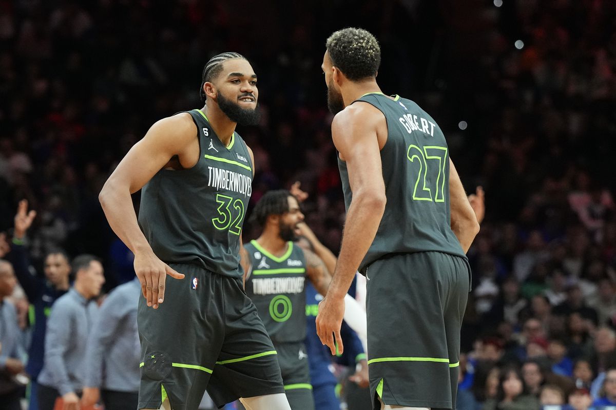Karl-Anthony Towns and Rudy Gobert celebrating, about to high-five