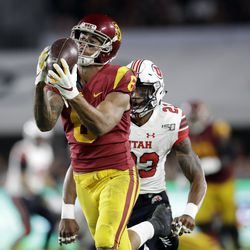Southern California wide receiver Michael Pittman Jr. (6) makes a catch in front of Utah defensive back Julian Blackmon (23) during the second half of an NCAA college football game Friday, Sept. 20, 2019, in Los Angeles. 