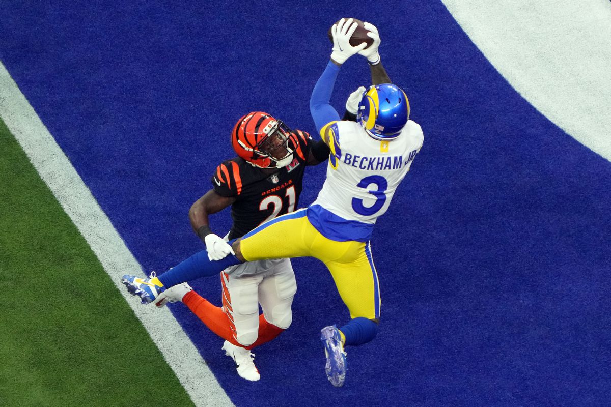 Los Angeles Rams wide receiver Odell Beckham Jr. (3) makes a catch for a touchdown against Cincinnati Bengals wide receiver Ja’Marr Chase (1) in the first quarter in Super Bowl LVI at SoFi Stadium.