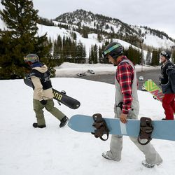 Ricky Ballesteros gets ready to snowboard with youth from the Chill Foundation at Brighton on Monday, March 20, 2017.