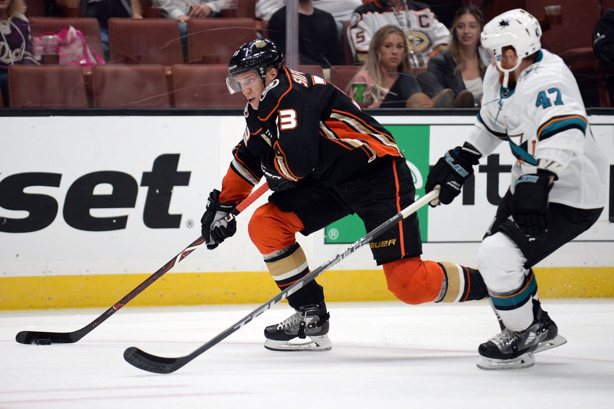 September 20, 2018; Anaheim, CA, USA; Anaheim Ducks right wing Jakob Silfverberg (33) moves the puck against San Jose Sharks left wing Francis Perron (47) during the third period at Honda Center. Mandatory Credit: Gary A. Vasquez