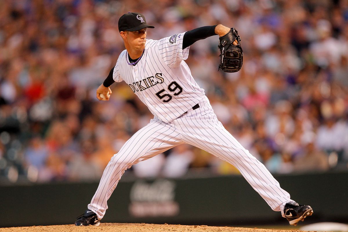 DENVER, CO:  Starting pitcher Clayton Mortensen #59 of the Colorado Rockies works the seventh inning against the Los Angeles Dodgers at Coors Field in Denver, Colorado. (Photo by Justin Edmonds/Getty Images)