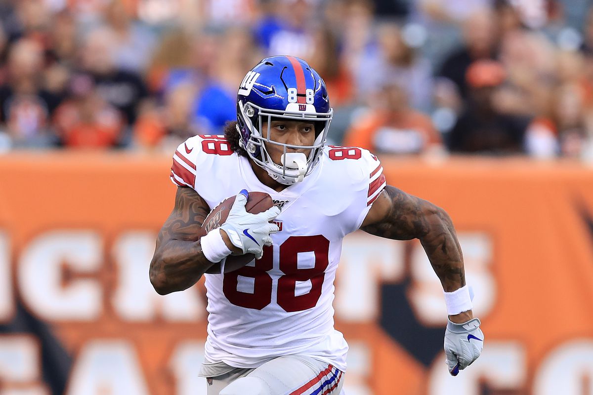 New York Giants tight end Evan Engram runs with the ball after a catch against the Cincinnati Bengals at Paul Brown Stadium on August 22, 2019 in Cincinnati, Ohio.