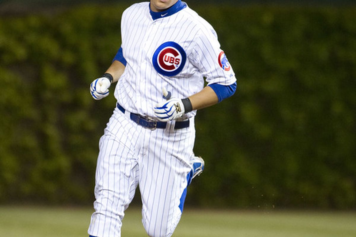 Bryan LaHair of the Chicago Cubs rounds the bases after hitting a home run to tie the game in the ninth inning against the St. Louis Cardinals at Wrigley Field on April 24, 2012 in Chicago, Illinois.  (Photo by Brian Kersey/Getty Images)