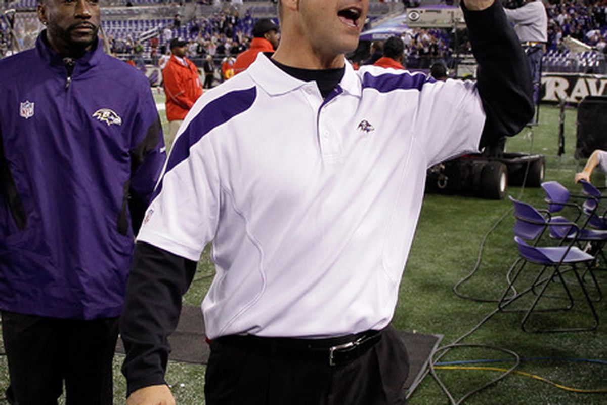 BALTIMORE, MD - OCTOBER 16: Head coach John Harbaugh of the Baltimore Ravens waves to the crowd after defeating the Houston Texans 29-14 at M&T Bank Stadium on October 16, 2011 in Baltimore, Maryland.  (Photo by Rob Carr/Getty Images)