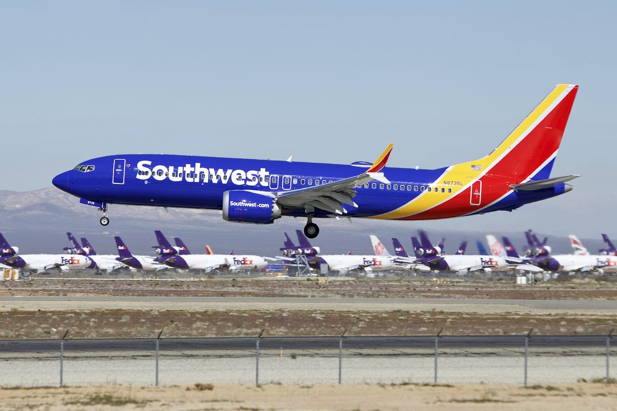 In this March 23, 2019, file photo, a Southwest Airlines Boeing 737 Max aircraft lands at the Southern California Logistics Airport in the high desert town of Victorville, Calif.