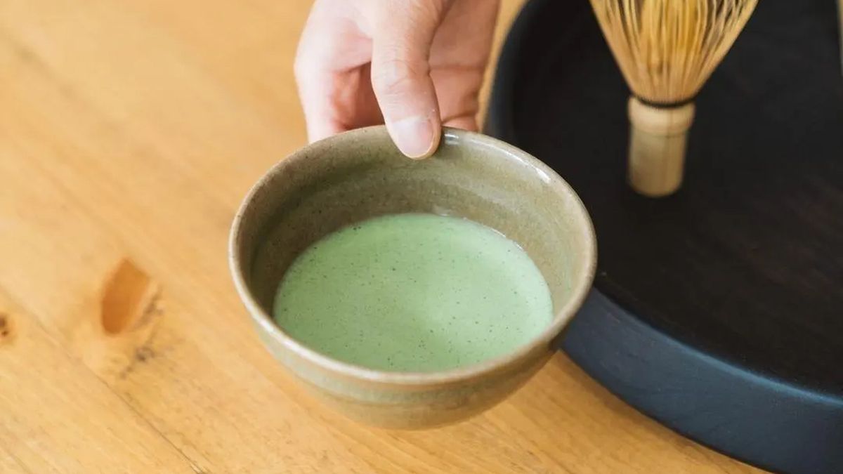 A bowl with green tea.