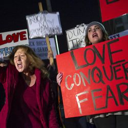 Tami Sablan, left, screams during an anti-Trump protest in Salt Lake City on Thursday, Nov. 10, 2016. Hundreds of protestors took to the streets to denounce the president-elect, ultimately making their way to the state Capitol. Sablan said she's afraid what Trump may do with the nation's military, especially with her son-in-law being in the armed forces. "I'm afraid he's going to get us into war," Sablan said.