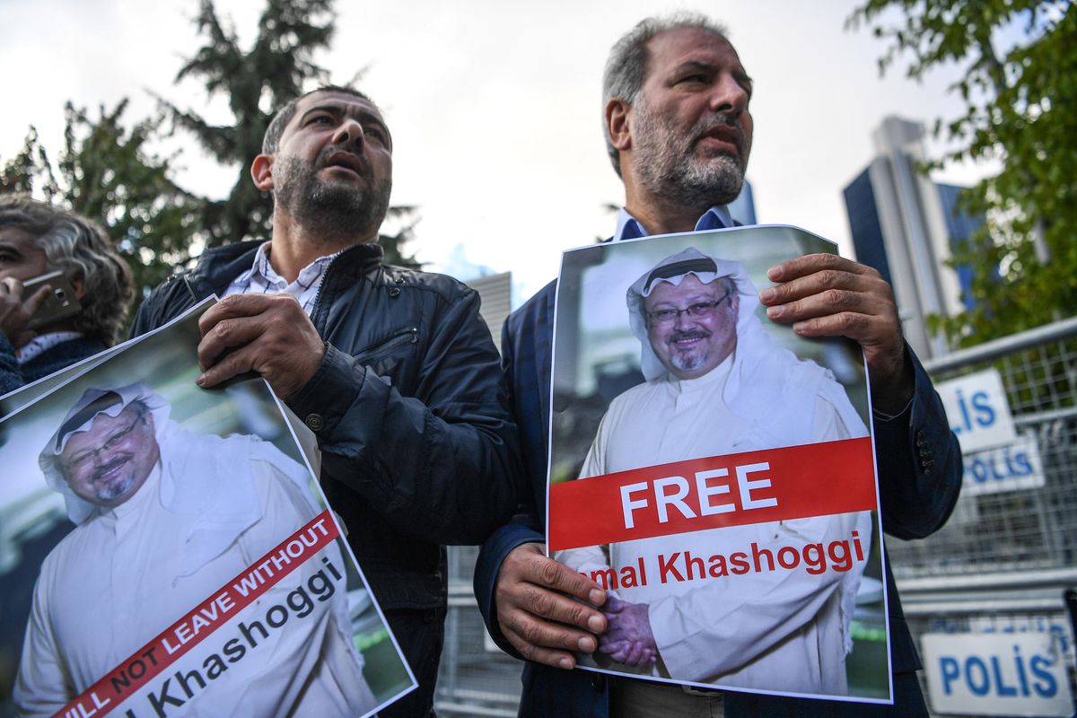 Protestors hold pictures of missing Saudi journalist Jamal Khashoggi during a demonstration in front of the Saudi Arabian consulate, on October 5, 2018 in Istanbul.