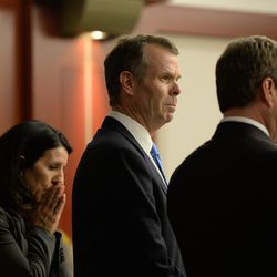 Former Utah Attorney General John Swallow listens, alongside his defense team, as the verdict is read during his public corruption trial at the Matheson Courthouse in Salt Lake City on  Thursday, March 2, 2017. Swallow found not guilty on all charges.