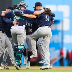 Members of the Seattle Mariners celebrate their win over the Cleveland Guardians at Progressive Field on Friday, April 7, 2023 in Cleveland, Ohio.
