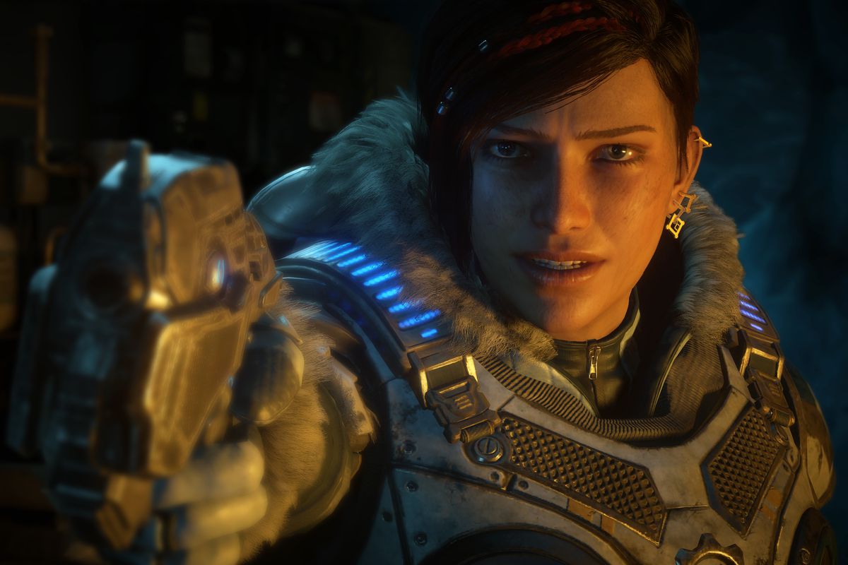 Kait aiming a pistol at the camera in Gears 5