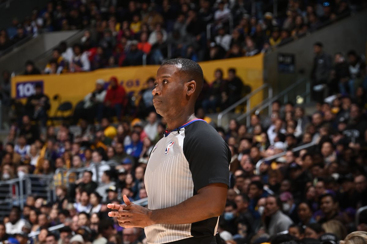 NBA referee James Williams #60 officiates the game between the Golden State Warriors and the Los Angeles Lakers during the game on March 5, 2023 at Crypto.Com Arena in Los Angeles, California.