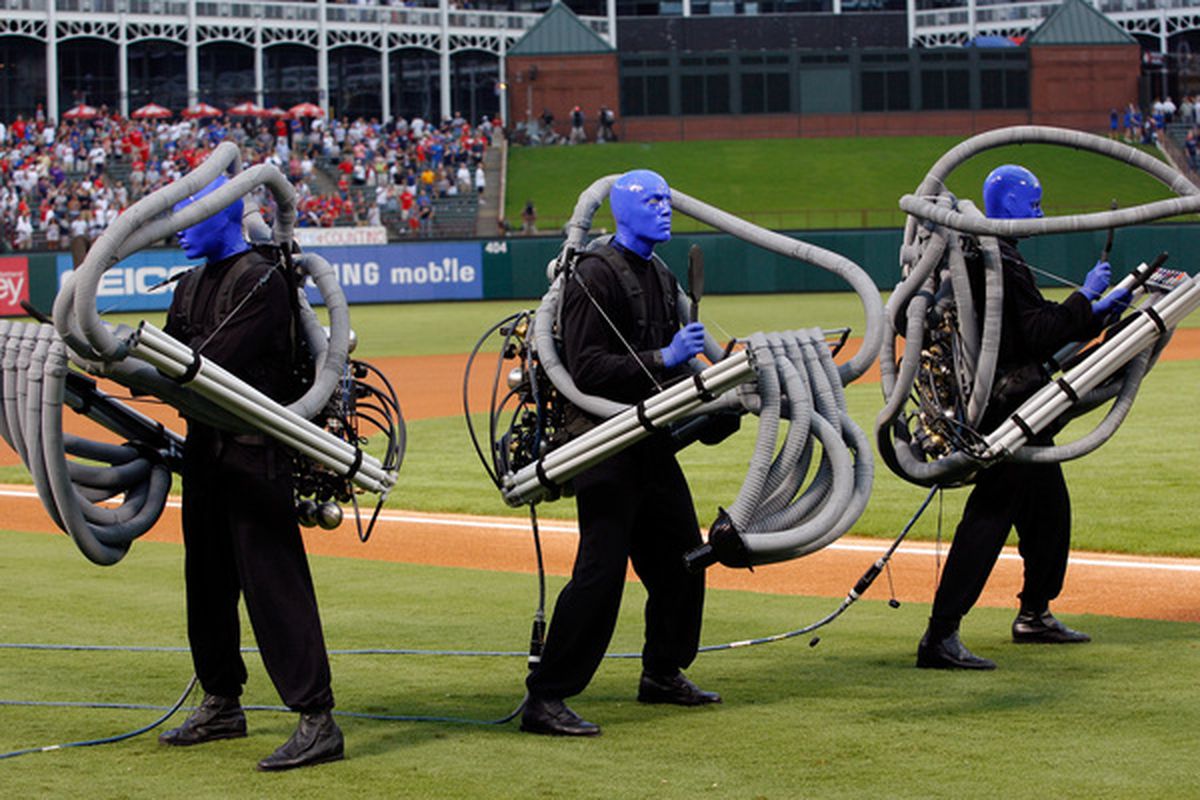 Oh, my GOD! It's aliens! Or it's the Blue Man Group performing at the Ballpark in Arlington.