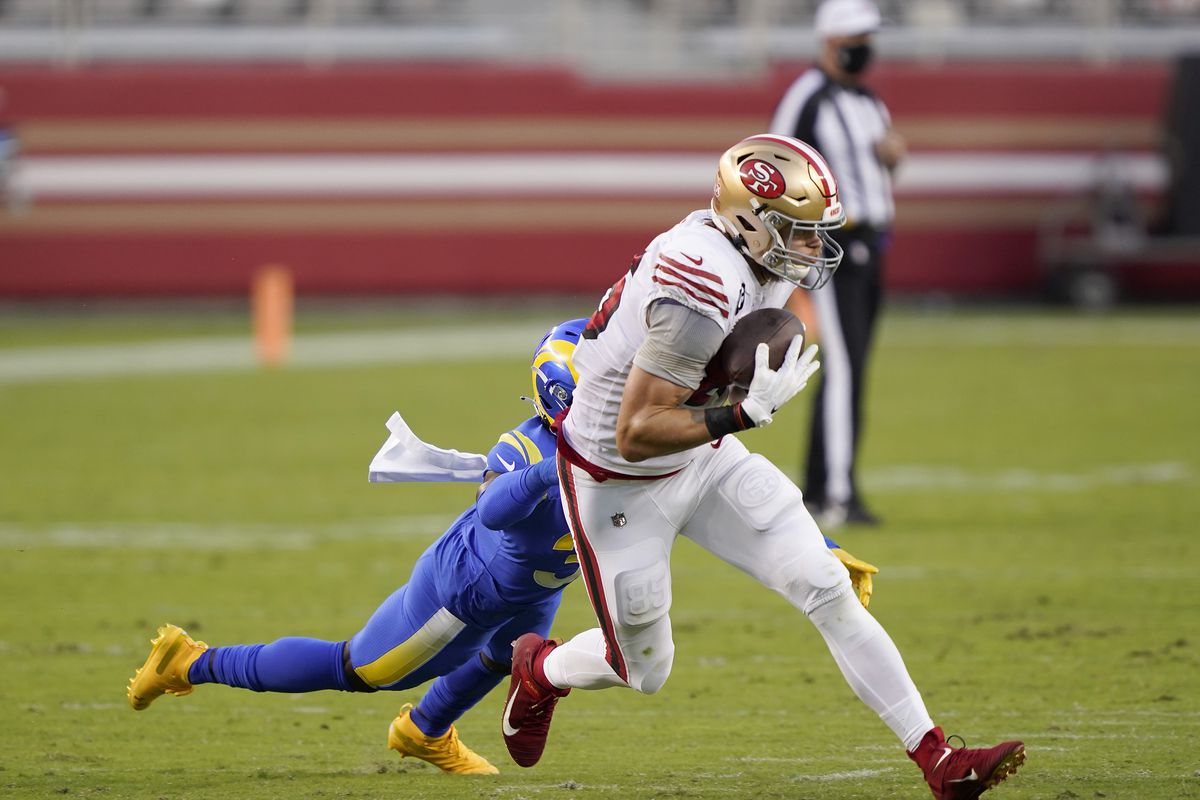 George Kittle #85 of the San Francisco 49ers catches a pass against the Los Angeles Rams during the second quarter of their NFL football game at Levi’s Stadium on October 18, 2020 in Santa Clara, California.