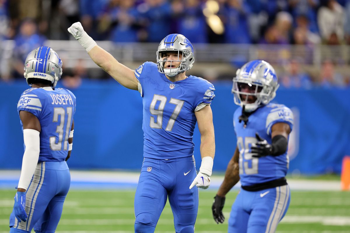 DETROIT, MICHIGAN - DECEMBER 11: Aidan Hutchinson #97 of the Detroit Lions reacts after a tackle against the Minnesota Vikings at Ford Field on December 11, 2022 in Detroit, Michigan.  &nbsp;   