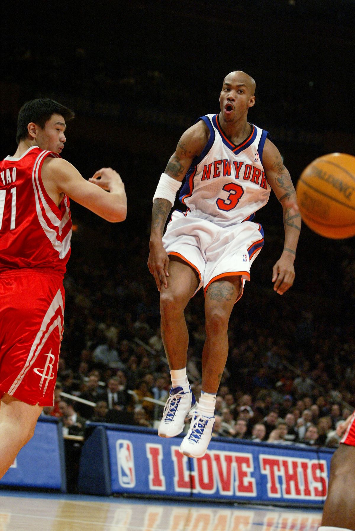 New York Knicks’ Stephon Marbury passes the ball in front of