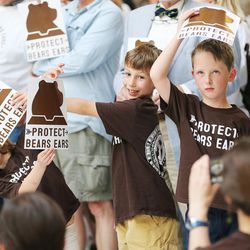 Zachary Sandwick, and Ilario and Biance Noyes pose for a photo during a rally at the  Capitol in Salt Lake City on Wednesday, May 18, 2016, to promote the creation of a Bears Ears National Monument.