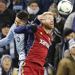 Kansas City's Claudio Bieler and Real's Nat Borchers battle for the ball as Real Salt Lake and Sporting KC play Saturday, Dec. 7, 2013 in MLS Cup action. Sporting KC won in a shootout.