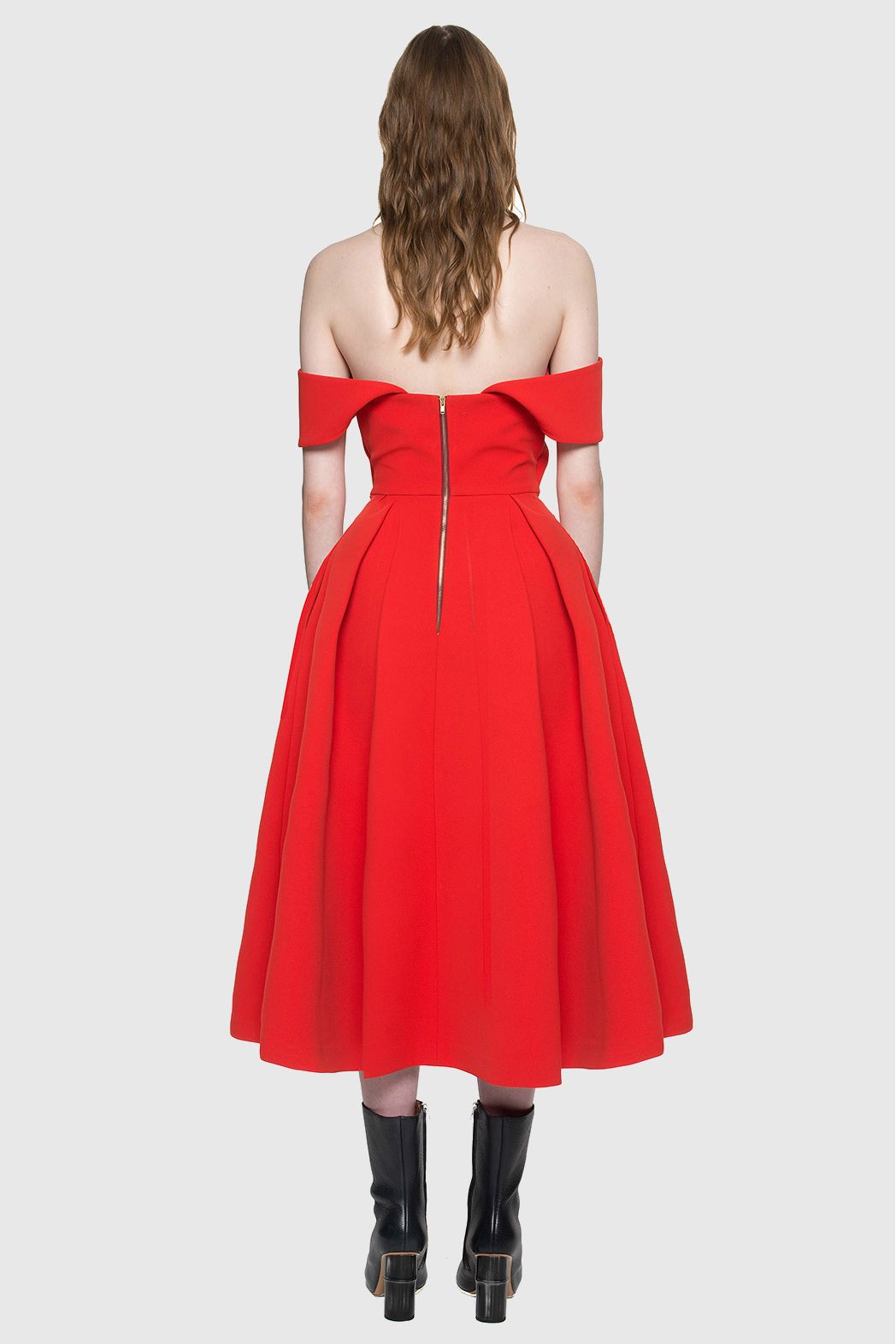 The back view of a red midi dress