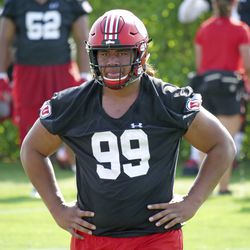 In this Wednesday, Aug. 1, 2018 photo, Utah's defensive tackle Leki Fotu looks on during NCAA college football practice in Salt Lake City. Strong defensive lines are a trademark of Utah's football program. After experiencing a drop-off in production along the line of scrimmage a year ago, the Utes are focused on re-establishing their dominance up front this season. (AP Photo/Rick Bowmer)