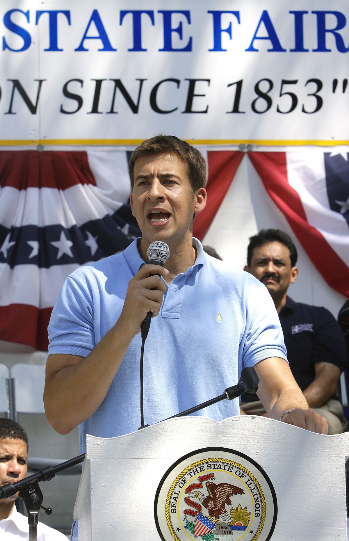 Then Democratic U.S. Senate candidate Alexi Giannoulias speaks during a rally on Democrats Day at the Illinois State Fair in 2010.