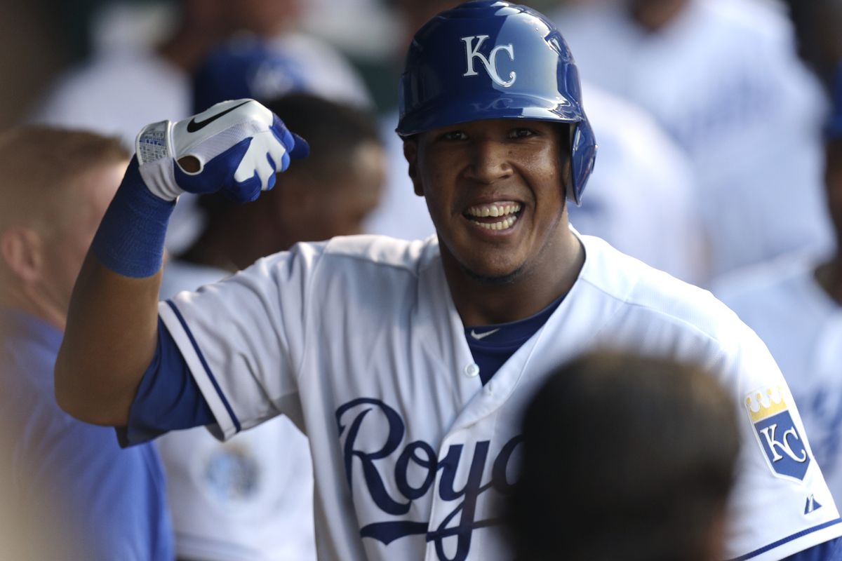 KANSAS CITY, MO - JULY 16: Salvador Perez #13 of the Kansas City Royals celebrates his home run against the Seattle Mariners in the third inning at Kauffman Stadium on July 16, 2012 in Kansas City, Missouri. (Photo by Ed Zurga/Getty Images)
