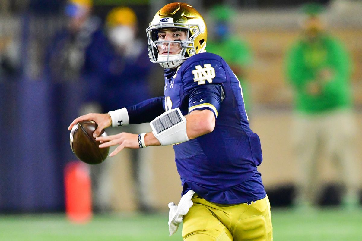 Quarterback Ian Book of the Notre Dame Fighting Irish throws in the first quarter against the Clemson Tigers at Notre Dame Stadium on November 7, 2020 in South Bend, Indiana.
