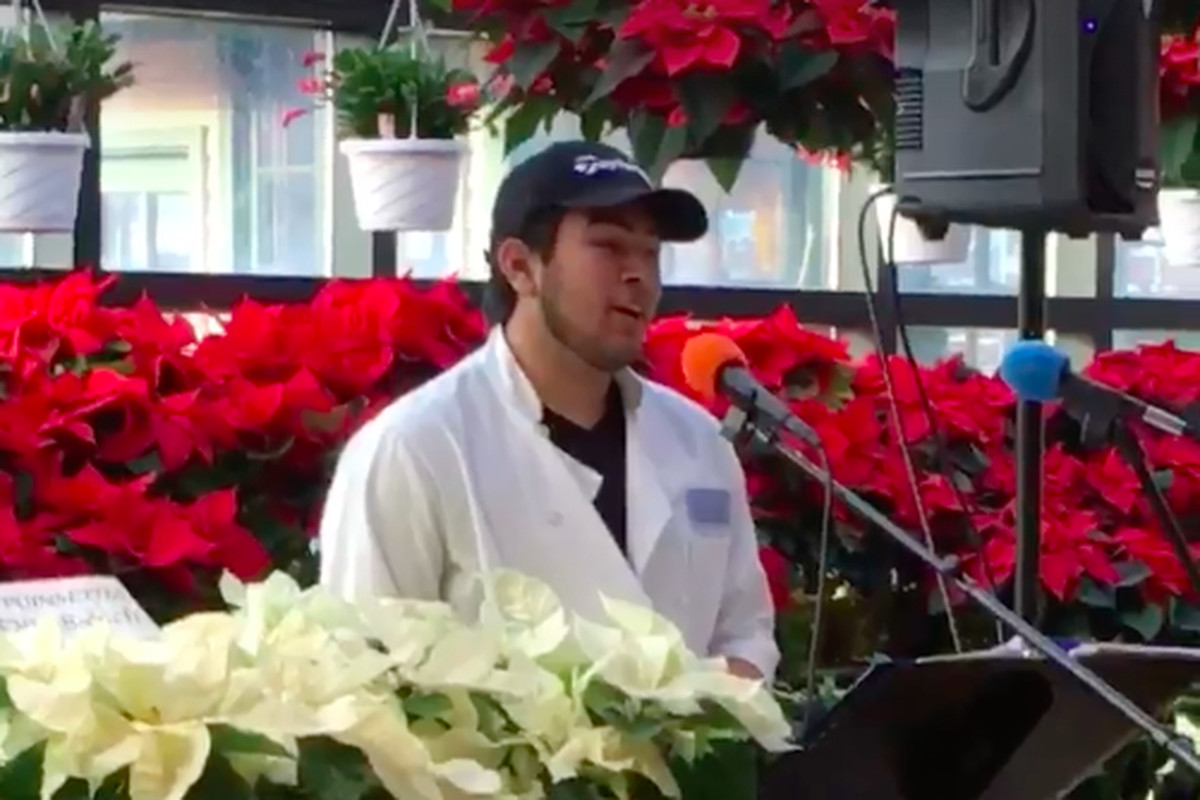 Russo’s employee Gilly Assuncao singing