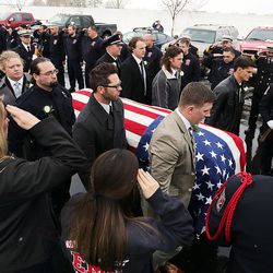Pallbearers carry Jake Shepherd's casket following his funeral in Nibley on Monday, Nov. 28, 2016. Shepherd was one of three crew members of a medical aircraft that crashed just after takeoff on Nov. 18 while transporting a patient from Elko, Nevada, to University Hospital in Salt Lake City. All four people died in the crash.