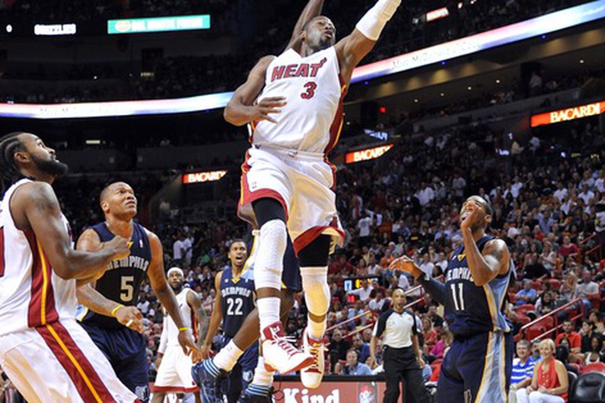 April 6, 2012; Miami, FL, USA; Miami Heat shooting guard Dwyane Wade (3) drives to the basket during the second half against the Memphis Grizzlies at American Airlines Arena. Mandatory Credit: Steve Mitchell-US PRESSWIRE