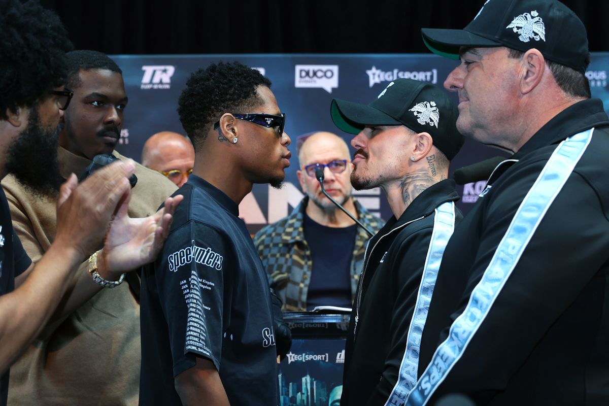 Devin Haney (L) and George Kambosos Jnr (R) face-off during the press conference ahead of the World Lightweight Undisputed Championship fight, at Rod Laver Arena on October 14, 2022 in Melbourne, Australia.