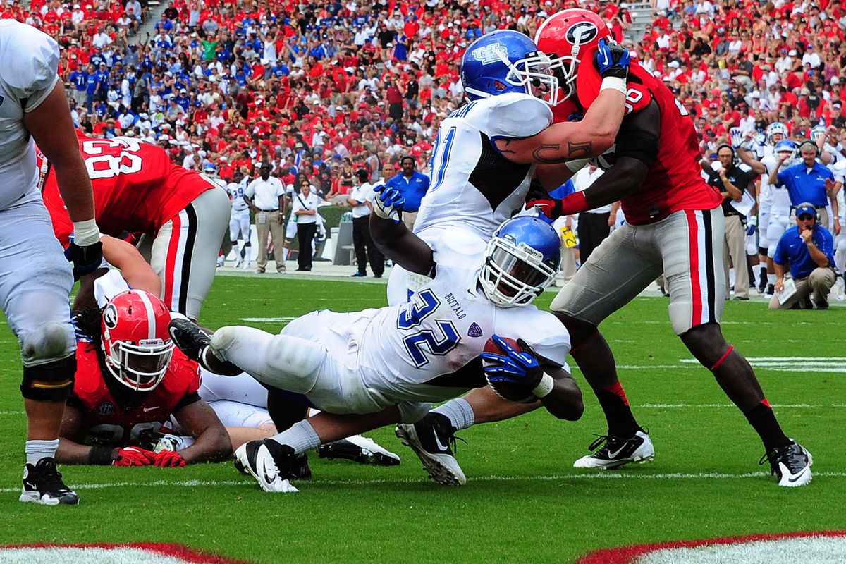ATHENS, GA - SEPTEMBER 1: Branden Oliver #32 of the Buffalo Bulls scores a second quarter touchdown against the Georgia Bulldogs at Sanford Stadium on September 1, 2012 in Athens, Georgia. (Photo by Scott Cunningham/Getty Images)