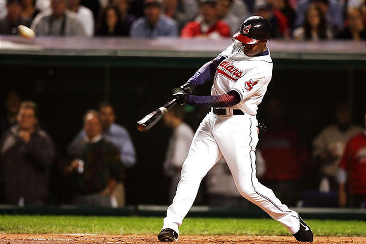 Cleveland's Kenny Lofton smacks a two-run home run in the second inning against Boston to help power the Indians past the Red Sox on Monday night in Cleveland for a 2-1 lead in the ALCS.